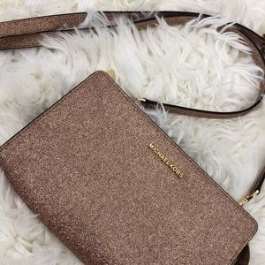 Michael Kors rosegold crossbody clutch leather